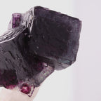 A fun deep purple 'alien eye' Fluorite on Quartz.