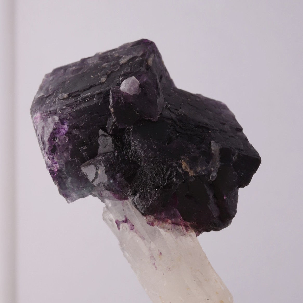 A fun deep purple 'alien eye' Fluorite on Quartz.