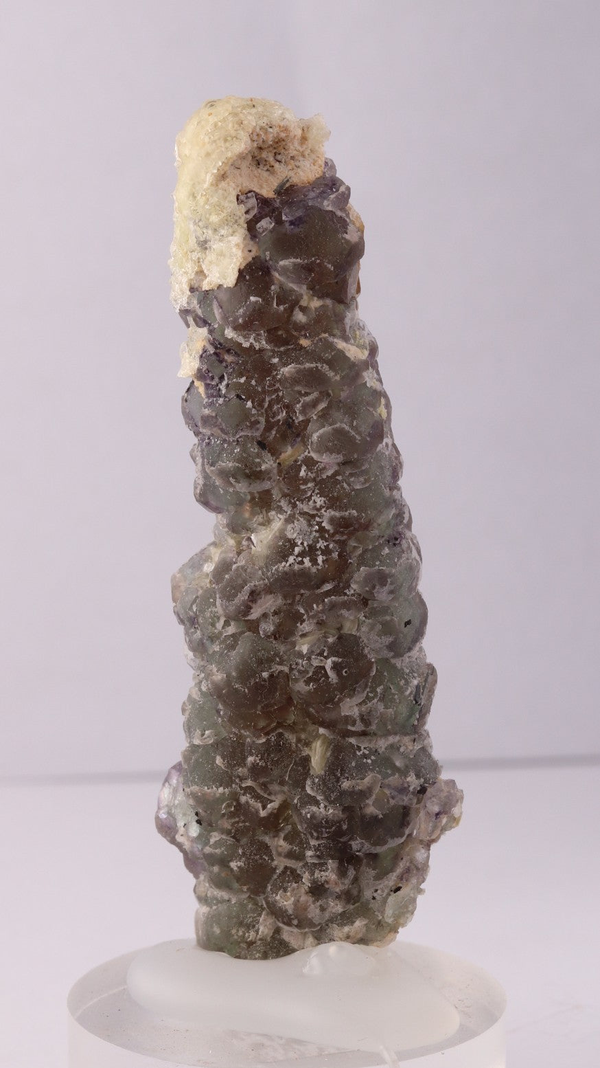 Back view of light green and purple Fluorite with Hyalite.