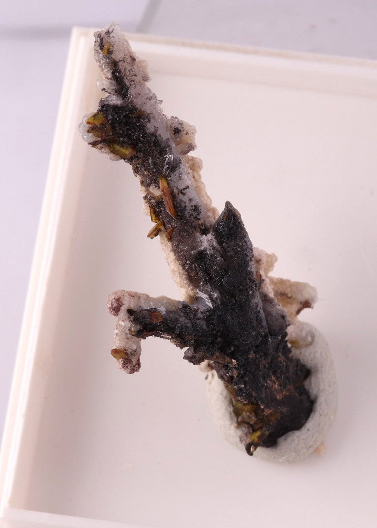 A Brucite on Calcite stick with Sturmanite crystals.&nbsp;&nbsp;