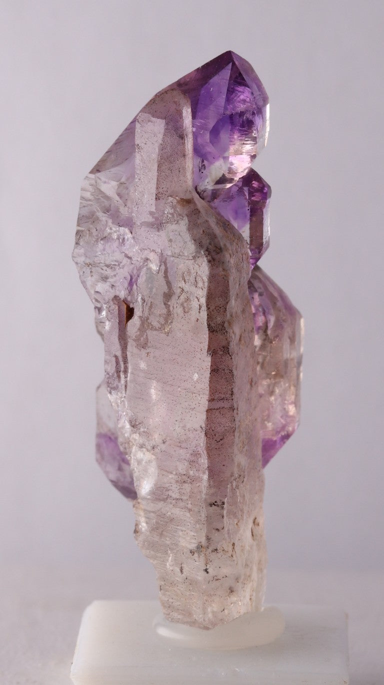 Back view of Amethyst Sceptres on a Quartz Point