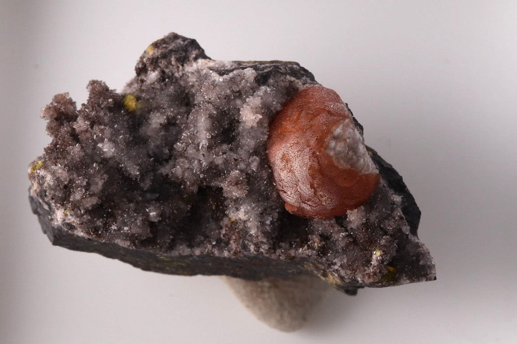 Combination of Brucite, Calcite and Sturmanite.