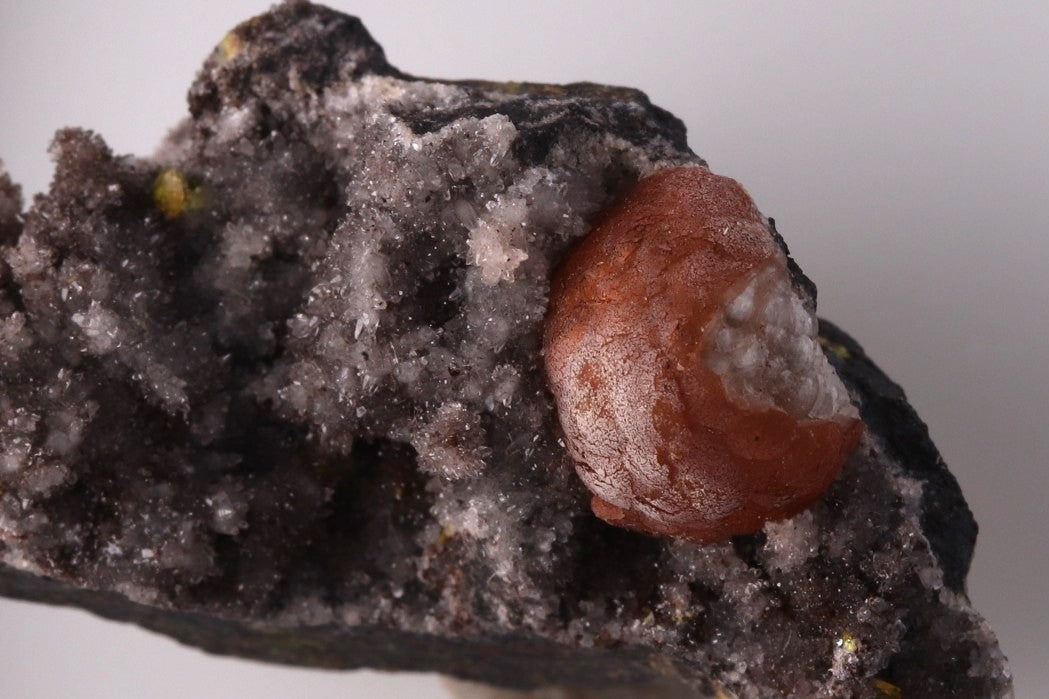 Combination of Brucite, Calcite and Sturmanite.