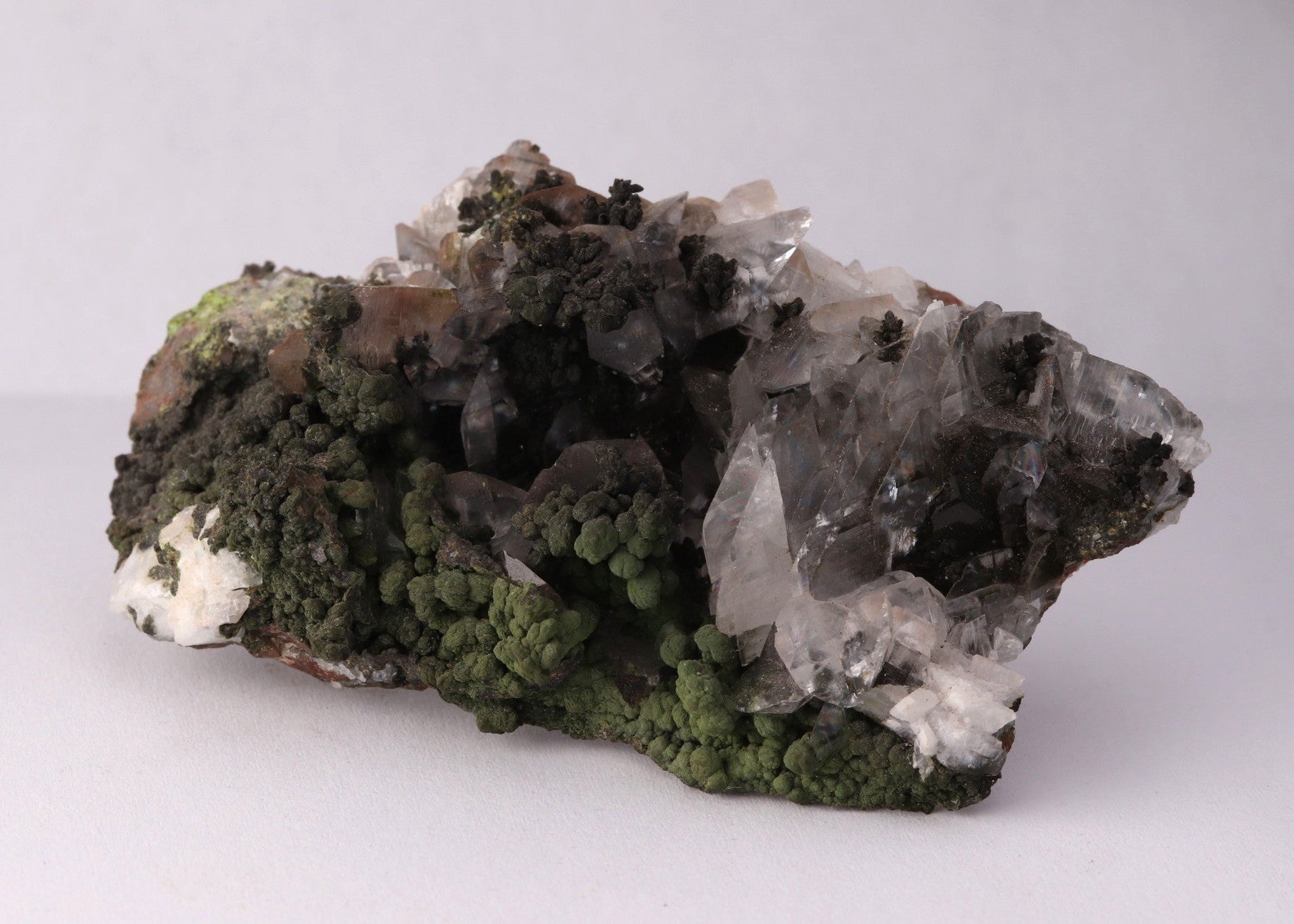 Slight side view of Calcite with Mottramite mineral specimen from Tsumeb, Oshikoto Region, Namibia