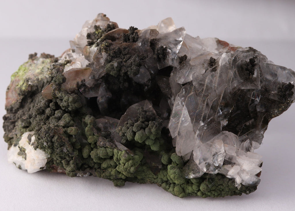 Slight close-up side view of Calcite with Mottramite mineral specimen from Tsumeb, Oshikoto Region, Namibia