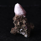 A double-terminated Calcite on Pyrite mineral specimen from Kalahari Manganese Fields, South Africa