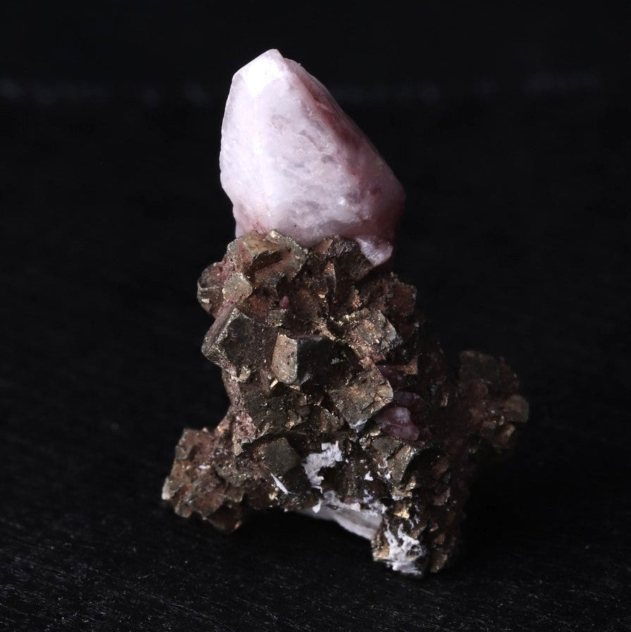 A double-terminated Calcite on Pyrite mineral specimen from Kalahari Manganese Fields, South Africa