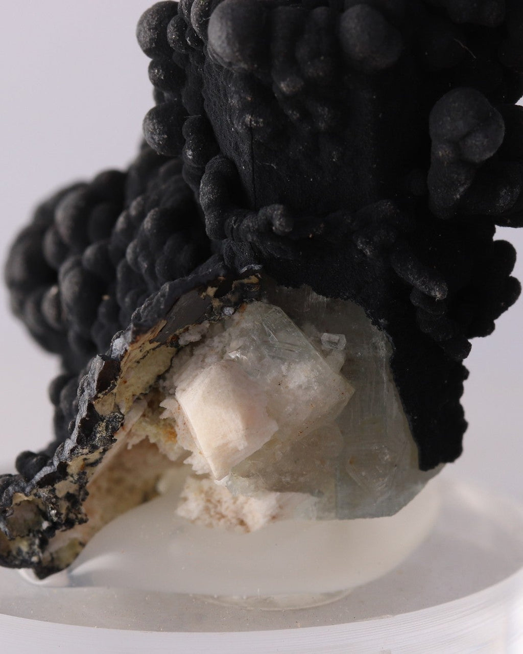 Close-up view of Coronadite with Aquamarine mineral specimen from the Erongo Region, Namibia