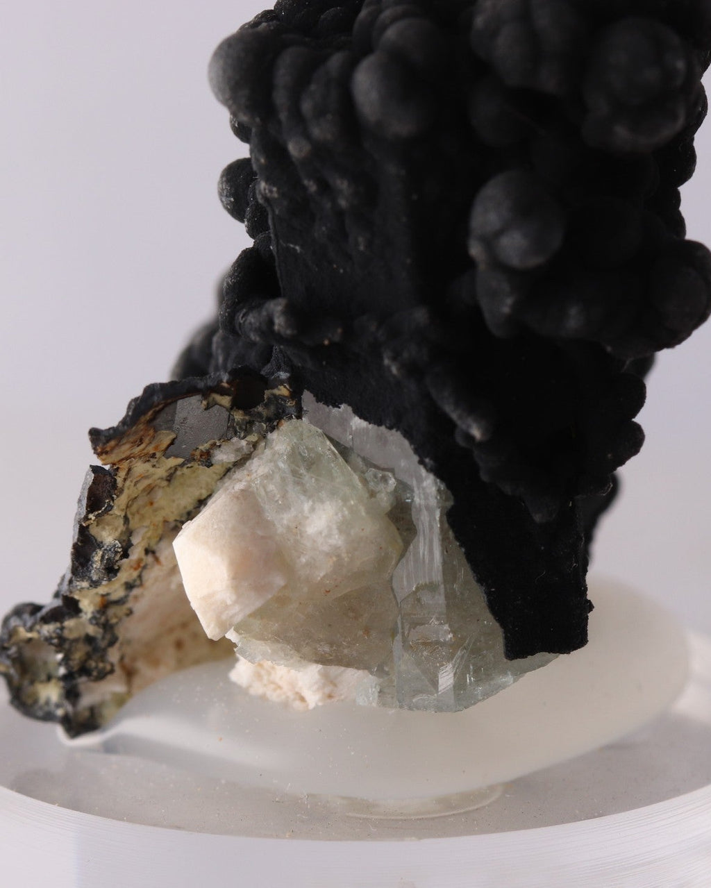 Close-up view of Coronadite with Aquamarine mineral specimen from the Erongo Region, Namibia