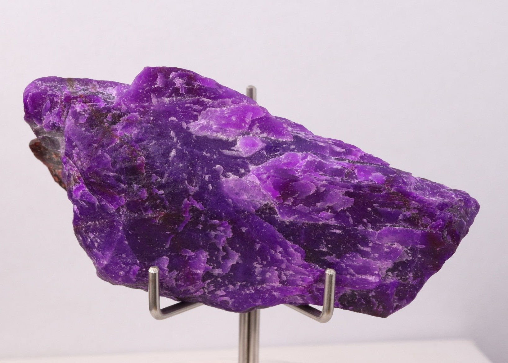 Front view of deep purple Sugilite mineral specimen from Wessels Mine, South Africa