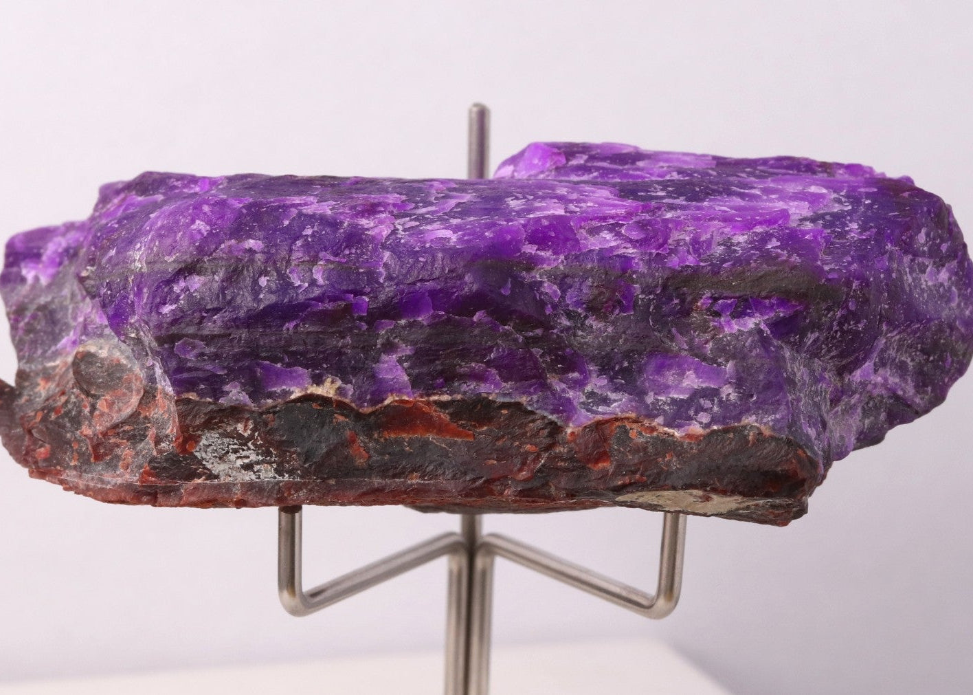 Side view of deep purple Sugilite mineral specimen from Wessels Mine, South Africa