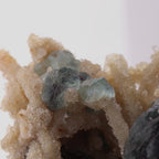 Close-up view of adorable blue Fluorite balls with unknown.