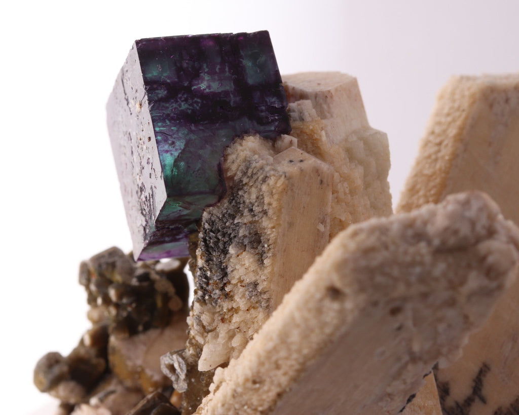 Close-up view of gorgeous blue-purple Fluorite cube on Feldspar from Erongo Region, Namibia