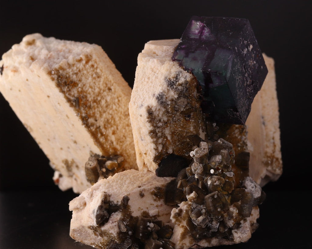 Side view of gorgeous blue-purple Fluorite cube on Feldspar from Erongo Region, Namibia