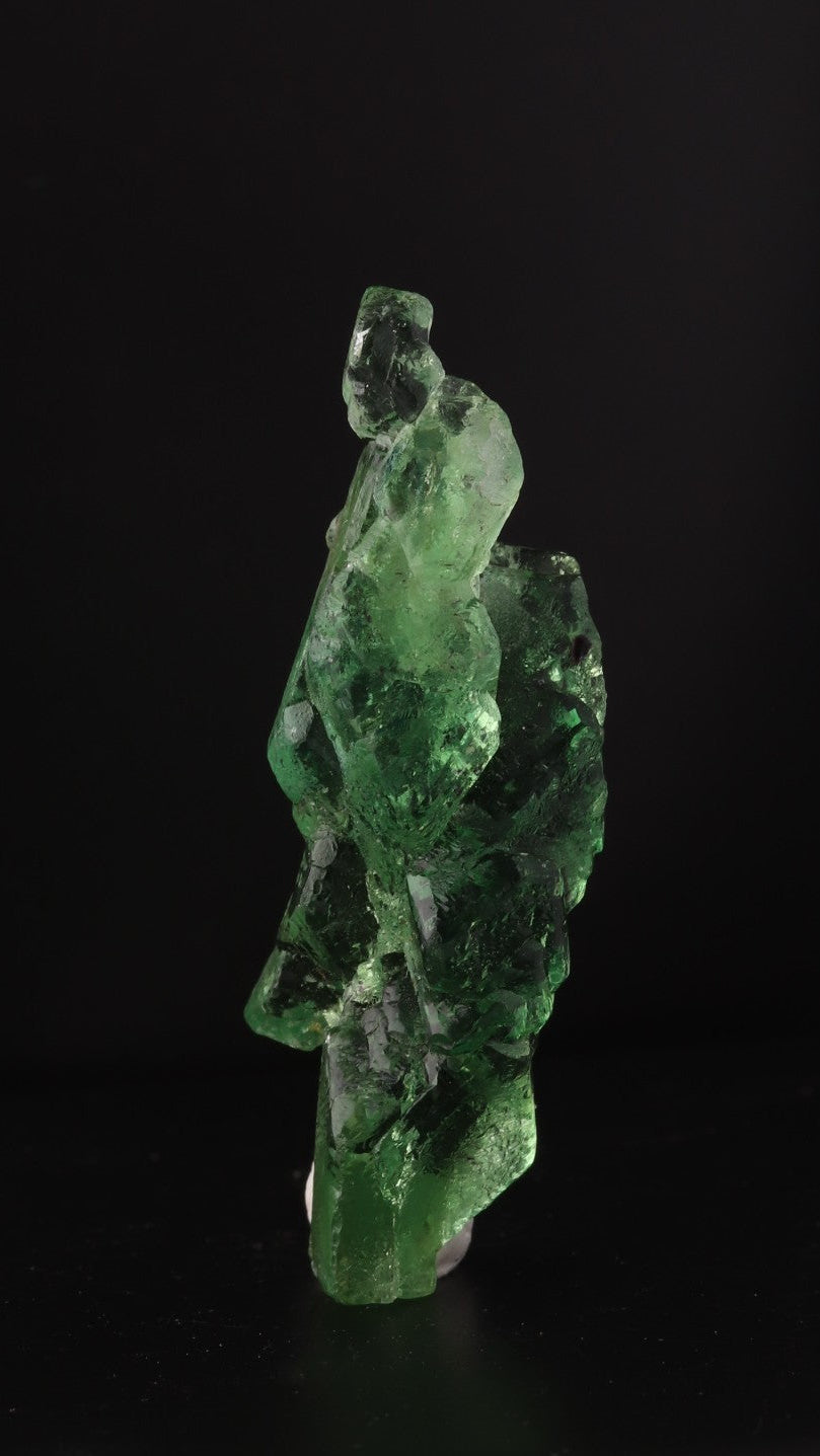 Back view of gemmy green naturally etched fluorite from Erongo Region, Namibia