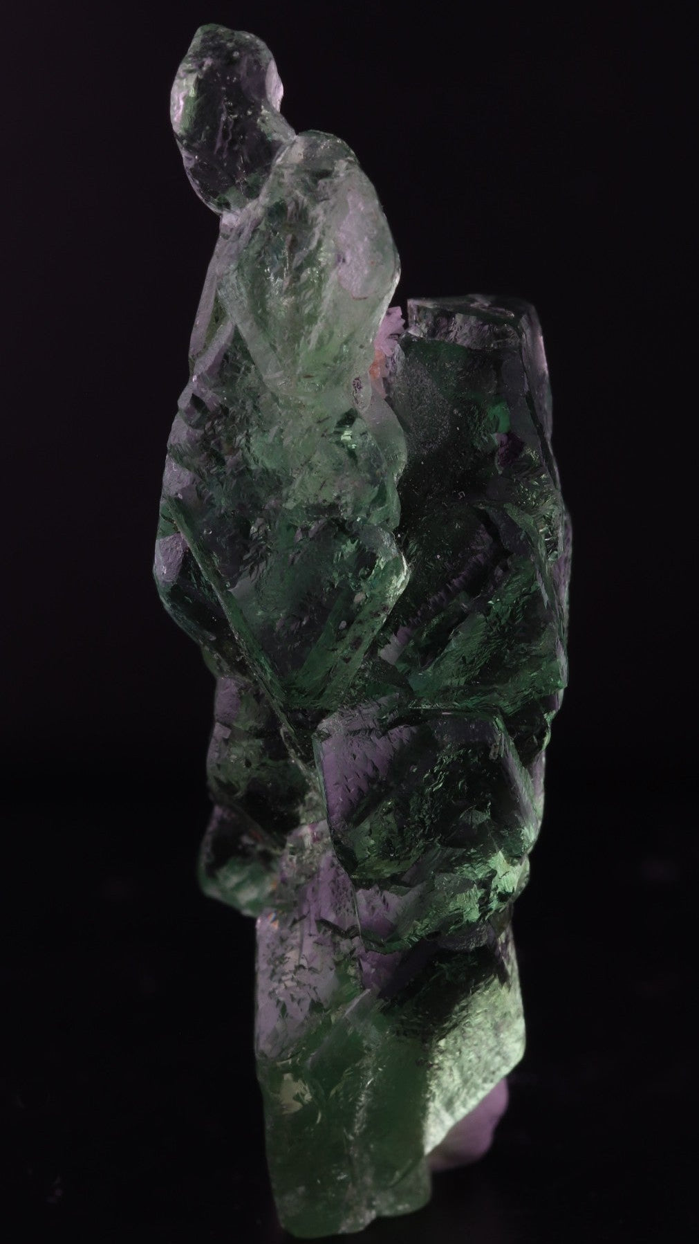 Light shinning through front of gemmy green naturally etched fluorite from Erongo Region, Namibia