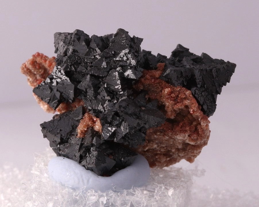 Front view of Hausmannite with Andradite and possibly Bementite from N'Chwaning II, Kalahari Manganese Fields, South Africa
