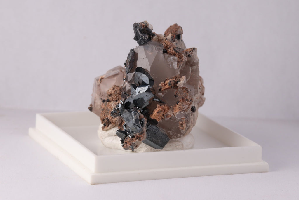 Side view of beautiful lustrous Hematite with Calcite mineral specimen from N'Chwaning II, KMF (Kalahari Manganese Fields), South Africa