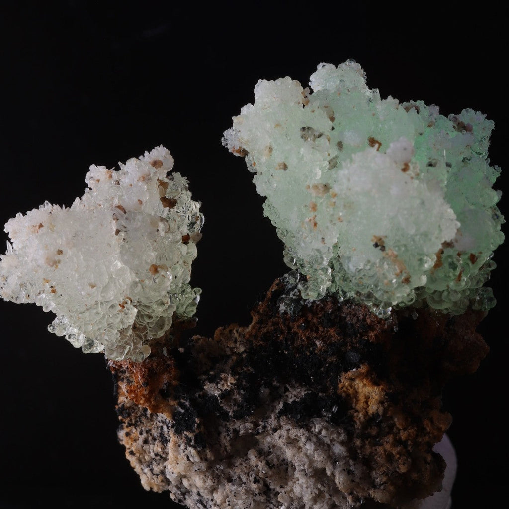 Single spray fluorescing of super cute fluorescent Hyalite from Erongo, Namibia