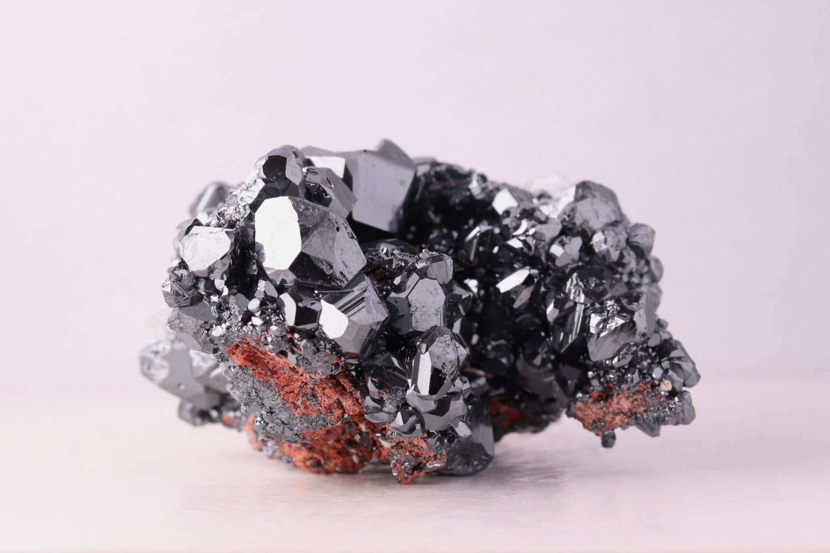 Side view of gorgeous lustrous Hematite with Calcite mineral specimen from N'Chwaning III, Kalahari Manganese Fields, South Africa