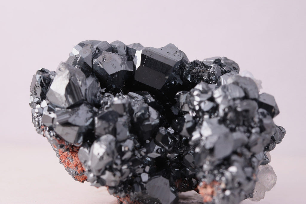 Close-up view of gorgeous lustrous Hematite with Calcite mineral specimen from N'Chwaning III, Kalahari Manganese Fields, South Africa