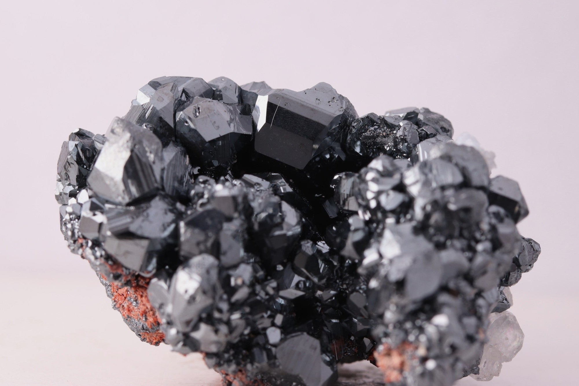 Close-up view of gorgeous lustrous Hematite with Calcite mineral specimen from N'Chwaning III, Kalahari Manganese Fields, South Africa
