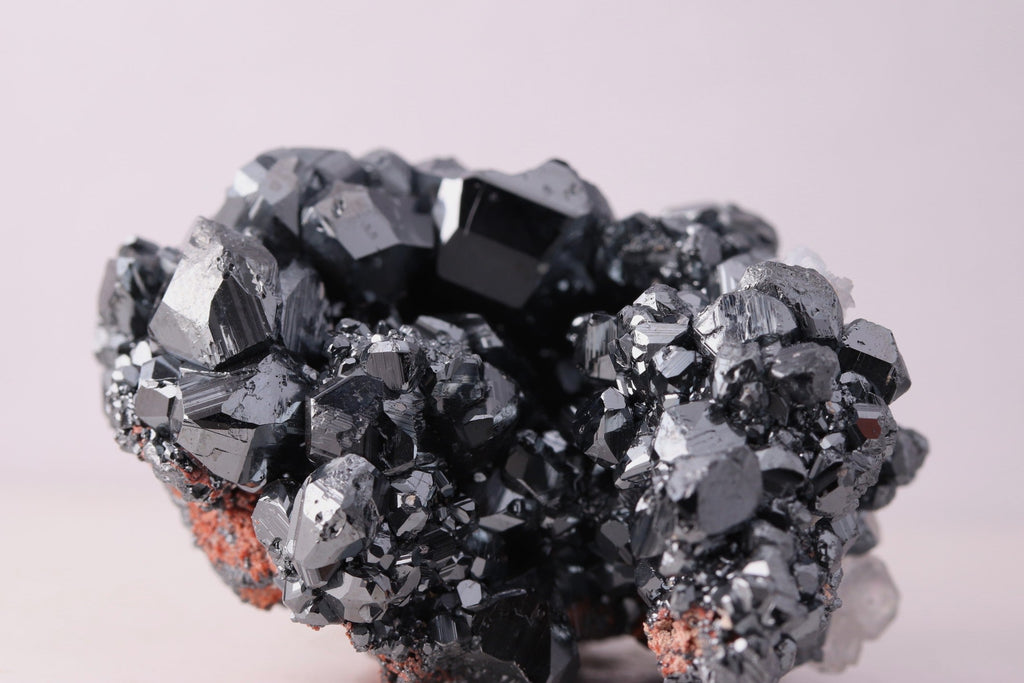 Close-up view of gorgeous lustrous Hematite with Calcite mineral specimen from N'Chwaning III, Kalahari Manganese Fields, South Africa