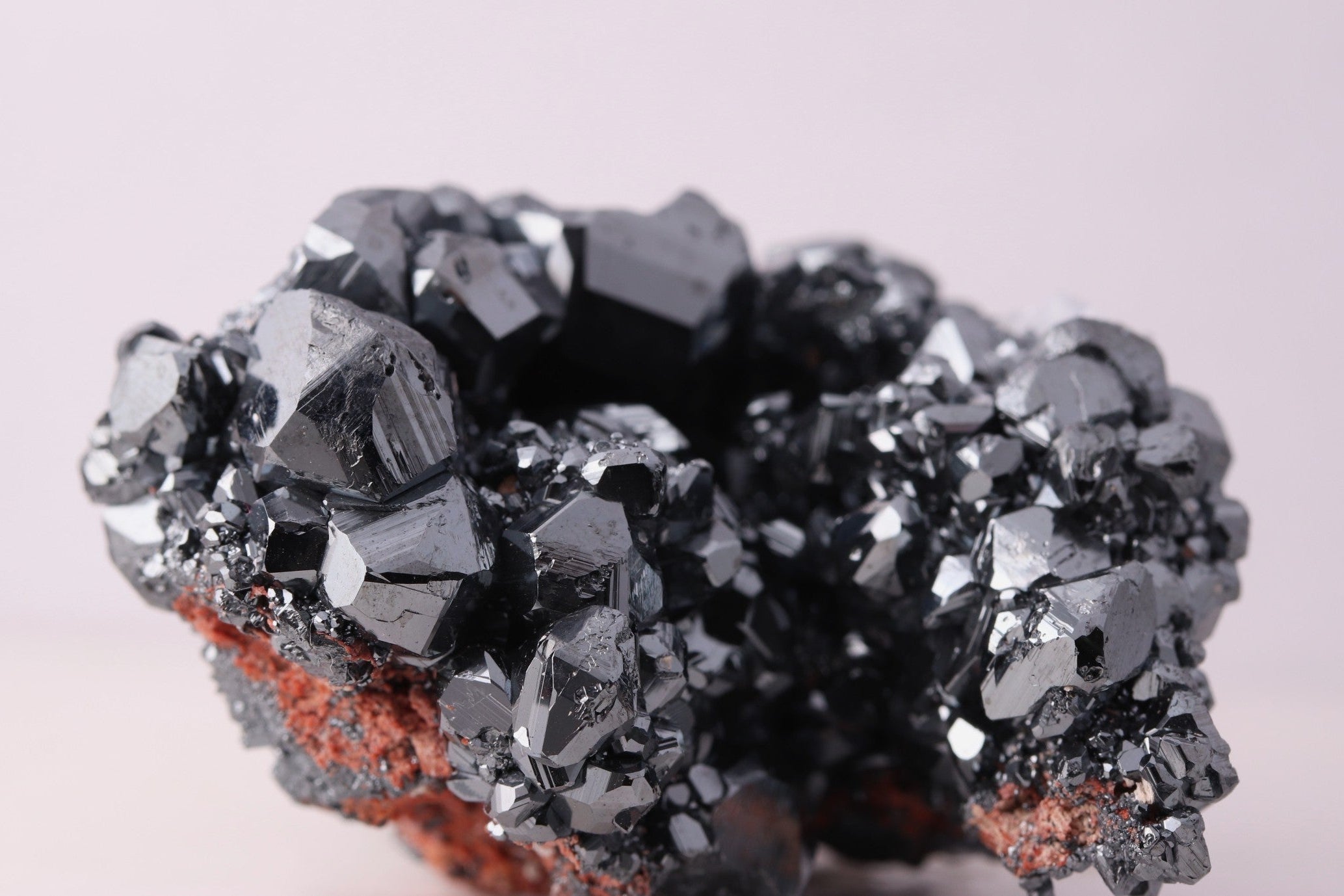 Close-up view of gorgeous lustrous Hematite with Calcite mineral specimen from N'Chwaning III, Kalahari Manganese Fields, South Africa