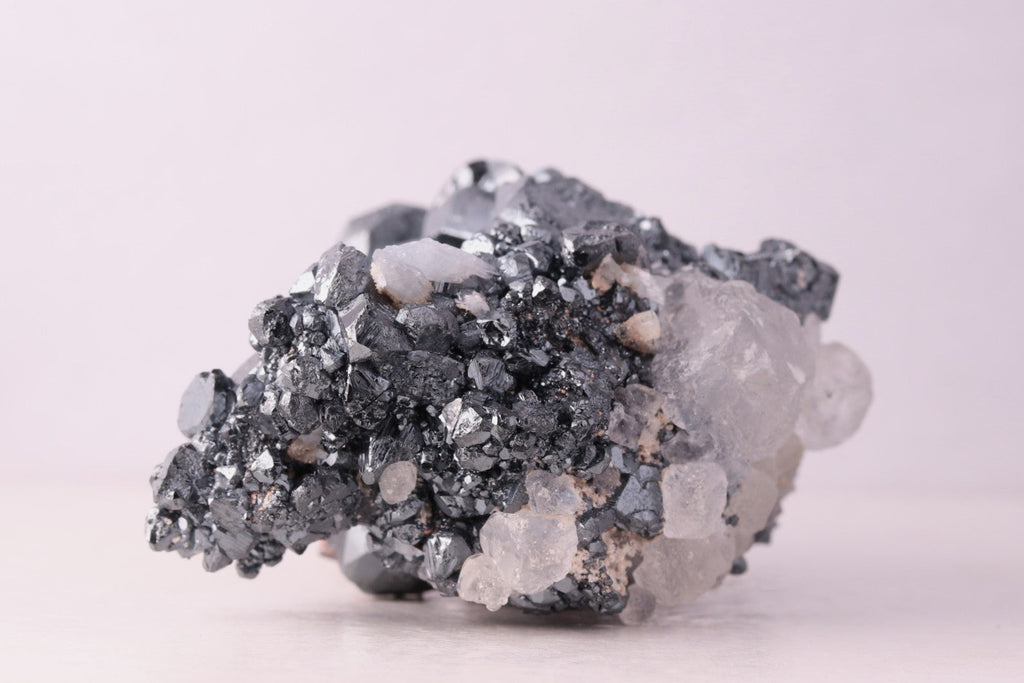 Side view of gorgeous lustrous Hematite with Calcite mineral specimen from N'Chwaning III, Kalahari Manganese Fields, South Africa
