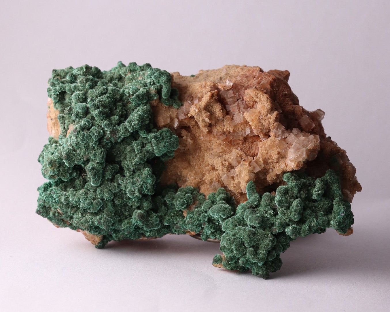 Front view of Malachite with Calcite mineral specimen from Tsumeb, Oshikoto Region, Namibia