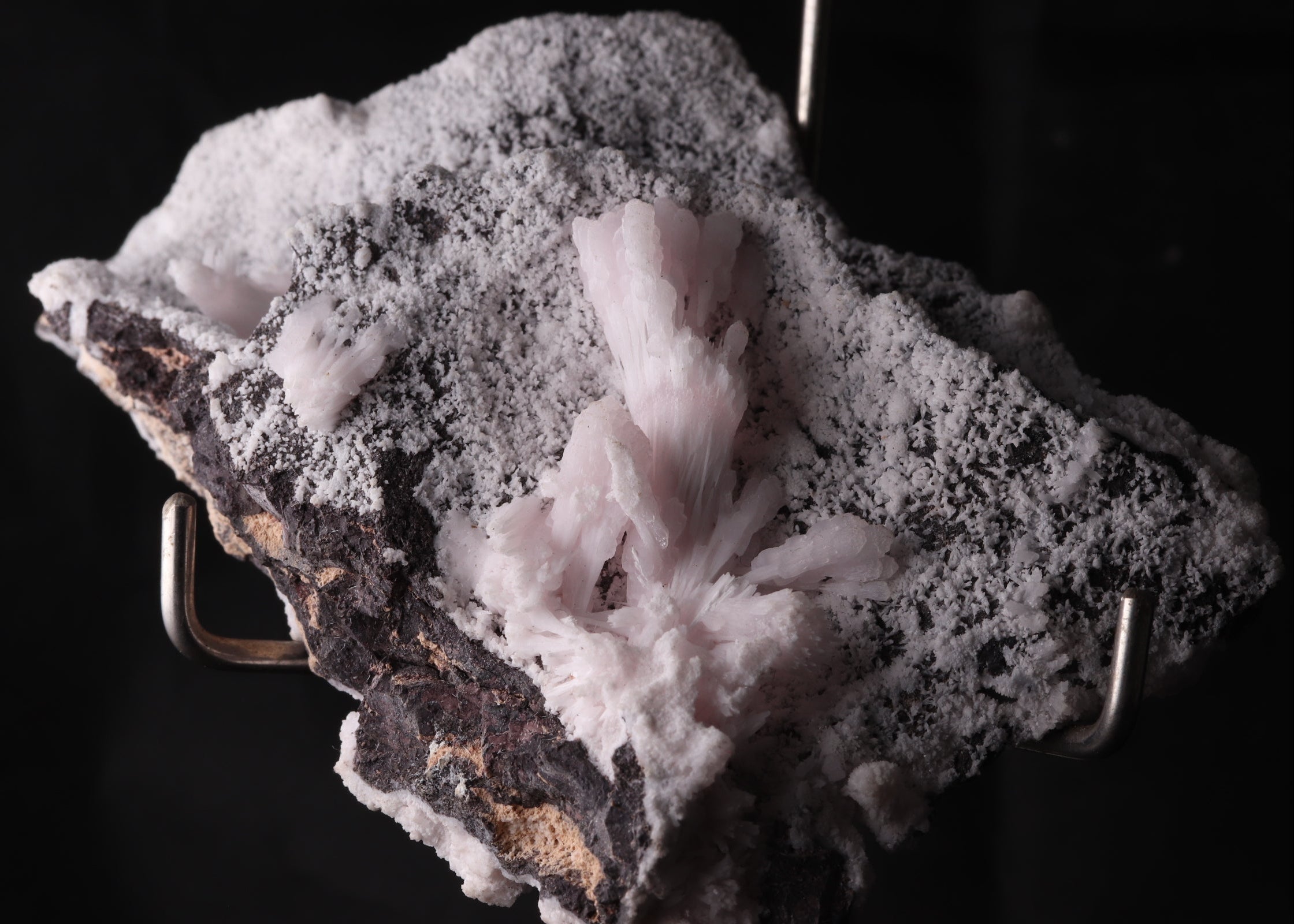 Close-up view of fluorescent Mangano-Calcite mineral specimen from N'Chwaning II, Kalahari Manganese Fields, South Africa