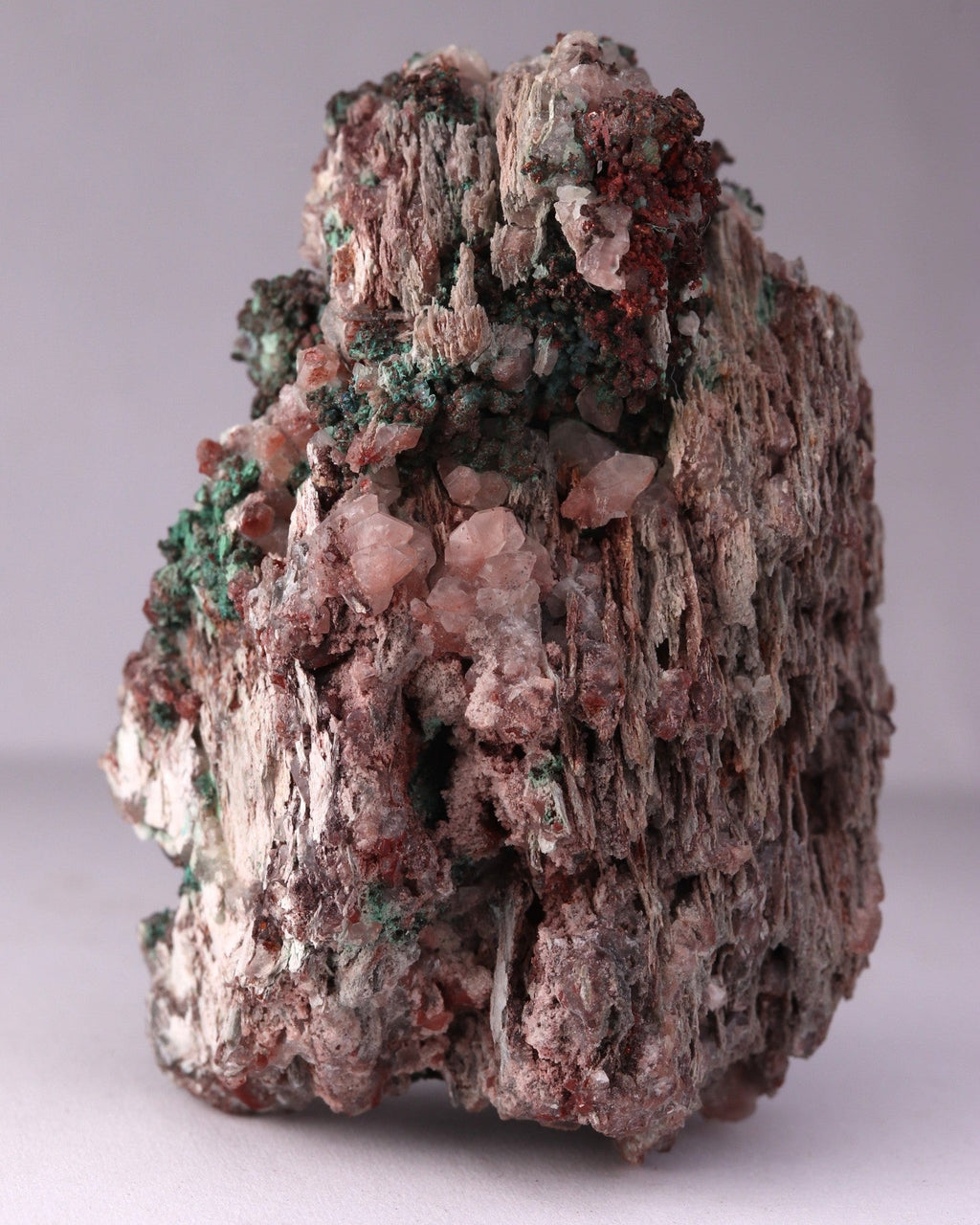 Close-up back view of Native Copper with Calcite and Malachite mineral specimen from Tsumeb, Oshikoto Region, Namibia