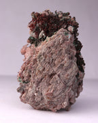 Close-up side view of Native Copper with Calcite and Malachite mineral specimen from Tsumeb, Oshikoto Region, Namibia