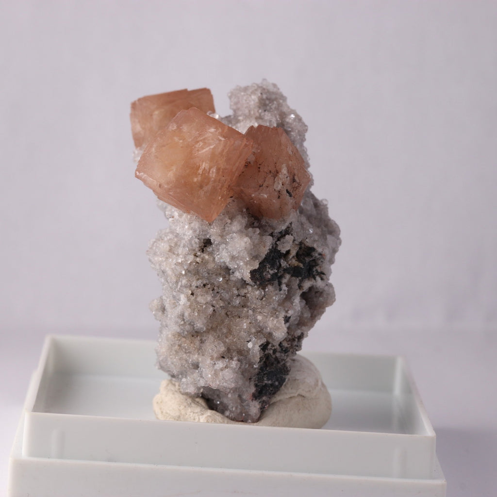 Olmiite with Calcite