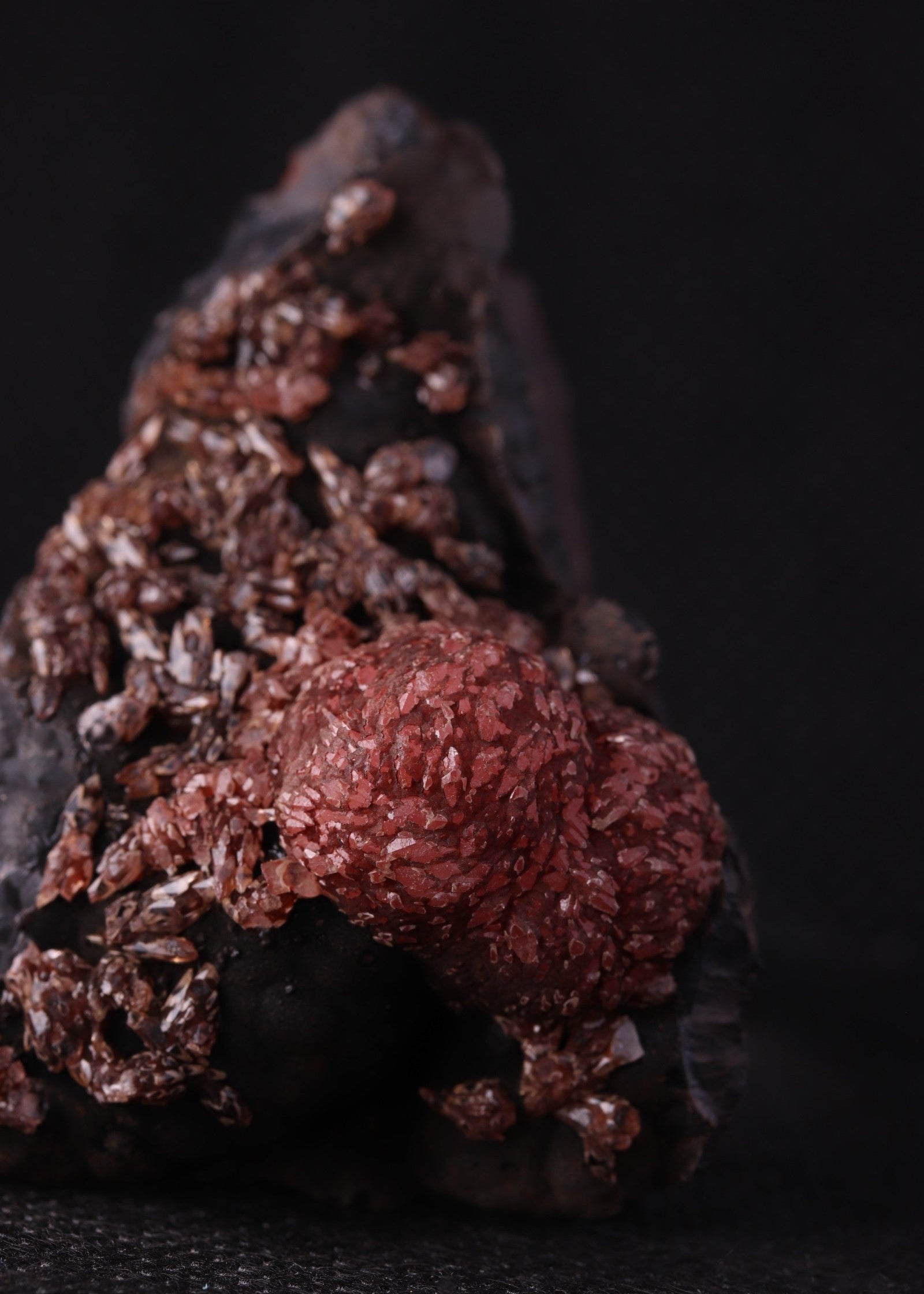 Close-up view of an unusual but aesthetic Rhodochrosite mineral specimen formation from Kalahari Manganese Fields, South Africa