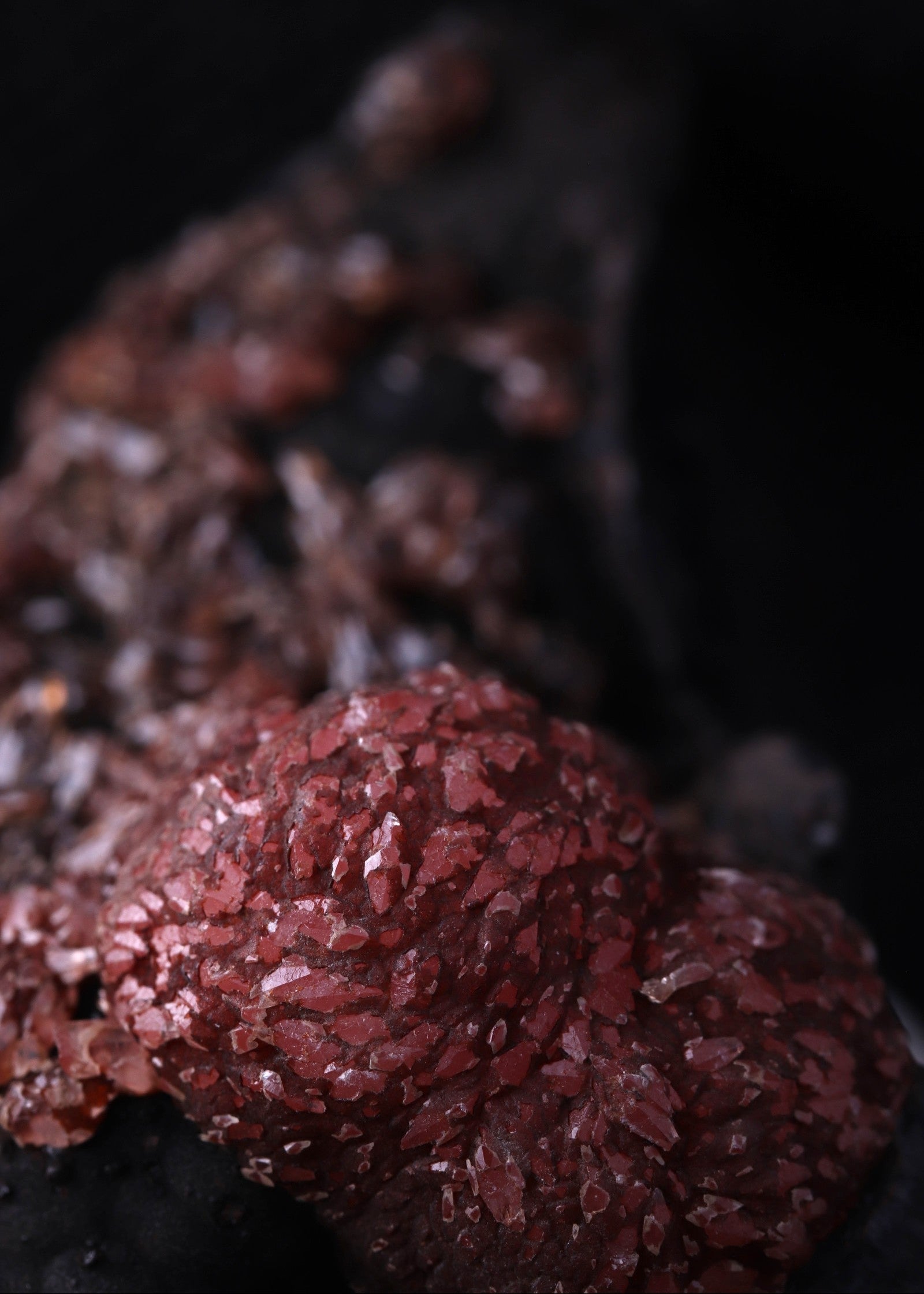 Super close-up view of an unusual but aesthetic Rhodochrosite mineral specimen formation from Kalahari Manganese Fields, South Africa
