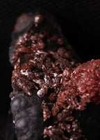 Super close-up view of an unusual but aesthetic Rhodochrosite mineral specimen formation from Kalahari Manganese Fields, South Africa