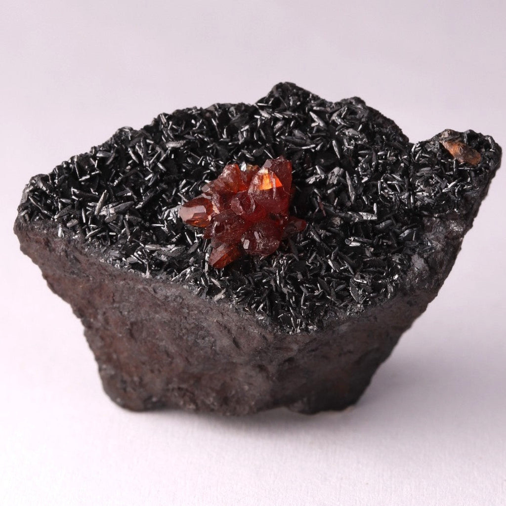 Front view of Rhodochrosite on Manganite mineral specimen from Kalahari Manganese Fields, South Africa