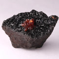 Front view of Rhodochrosite on Manganite mineral specimen from Kalahari Manganese Fields, South Africa