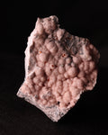 Front view of light pink Rhodochrosite with Shigaite from Kalahari Manganese Fields, South Africa. 