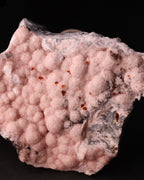 Close-up view of light pink Rhodochrosite with Shigaite from Kalahari Manganese Fields, South Africa. 