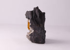 Side view of large gemmy Sturmanite crystal with Calcite on matrix from KMF (Kalahari Manganese Field), South Africa.