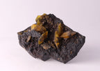 Front view of gemmy Sturmanite crystals on matrix from KMF (Kalahari Manganese Field), South Africa.