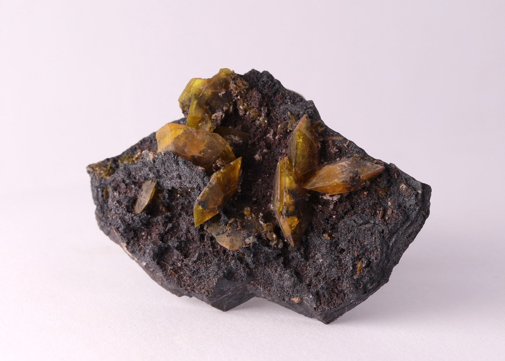 Front view of gemmy Sturmanite crystals on matrix from KMF (Kalahari Manganese Field), South Africa.