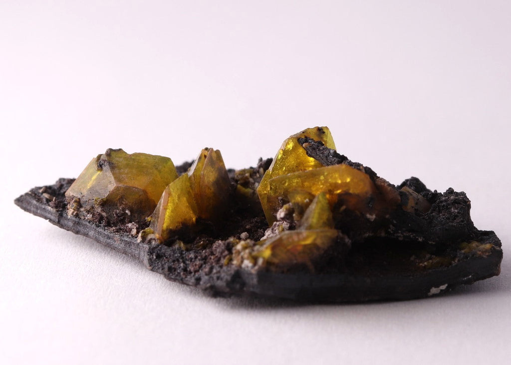 Flat view of golden gemmy Sturmanite crystals on matrix from KMF (Kalahari Manganese Field), South Africa. 