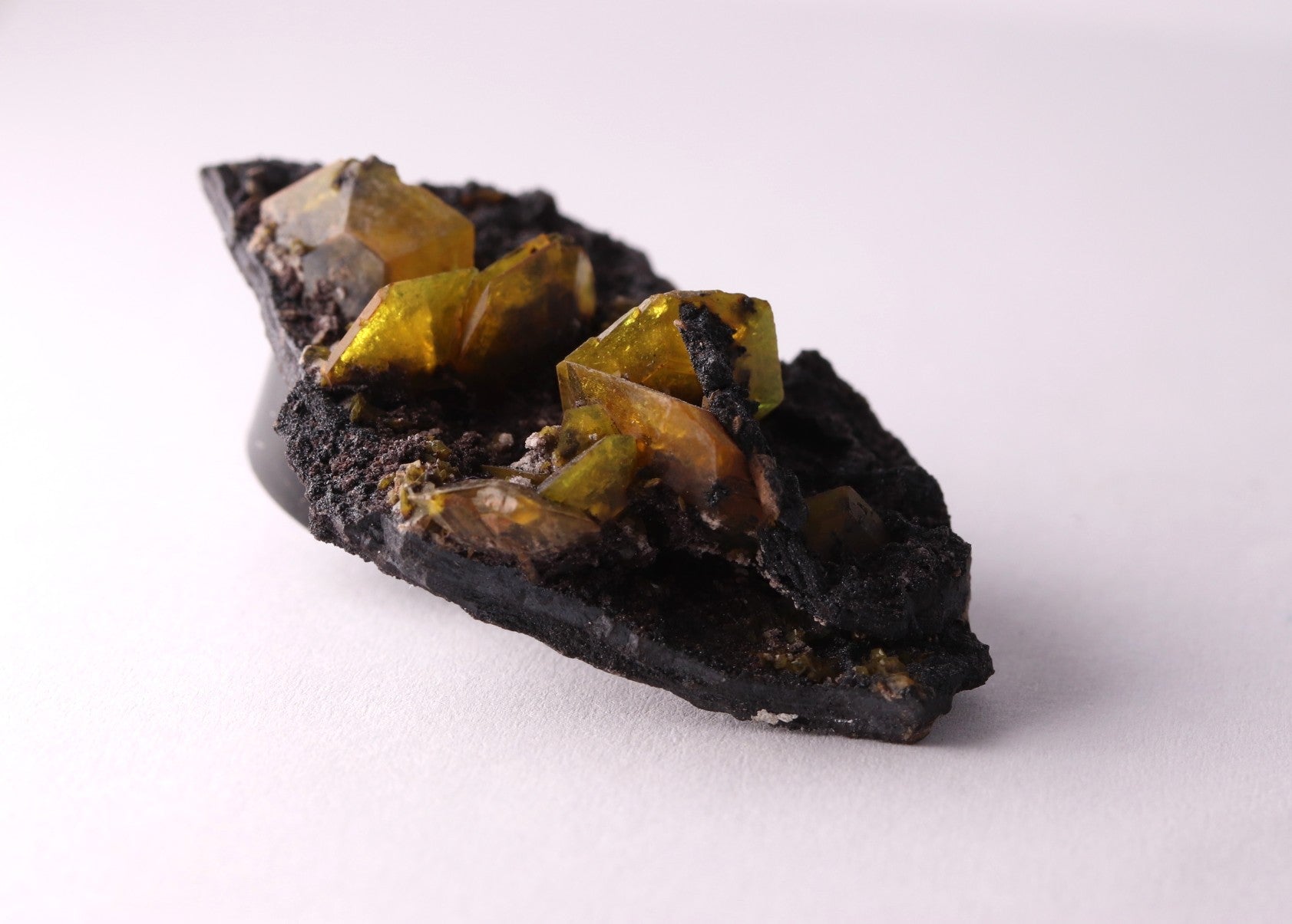 Flat view of gemmy Sturmanite crystals on matrix from KMF (Kalahari Manganese Field), South Africa.