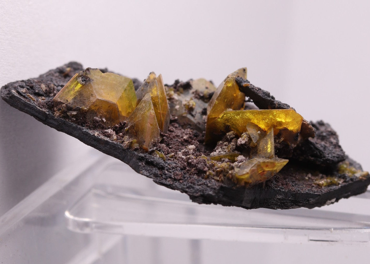 Golden gemmy glowing Sturmanite crystals on matrix from KMF (Kalahari Manganese Field), South Africa.