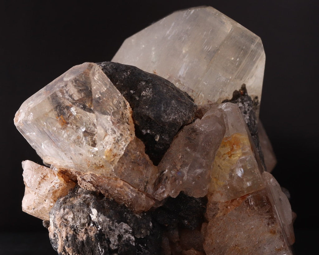 Side view of stunning large Topaz crystals among Schorl.